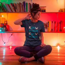 Know-Jesus-Know-Peace-T-shirt-on-girl-sitting-in-lights-Navy-from-forzatees.com